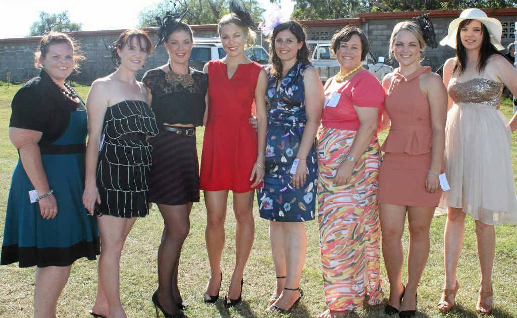 Kelli Mullins, Fiona White, Jenna Pauli, Brooke Walsh, Catherine Lutvey, Kathryn McConville, Sophie Griffin and Natalie Lancuba make a fashionable appearance at the Warwick Picnic Races at the weekend. 